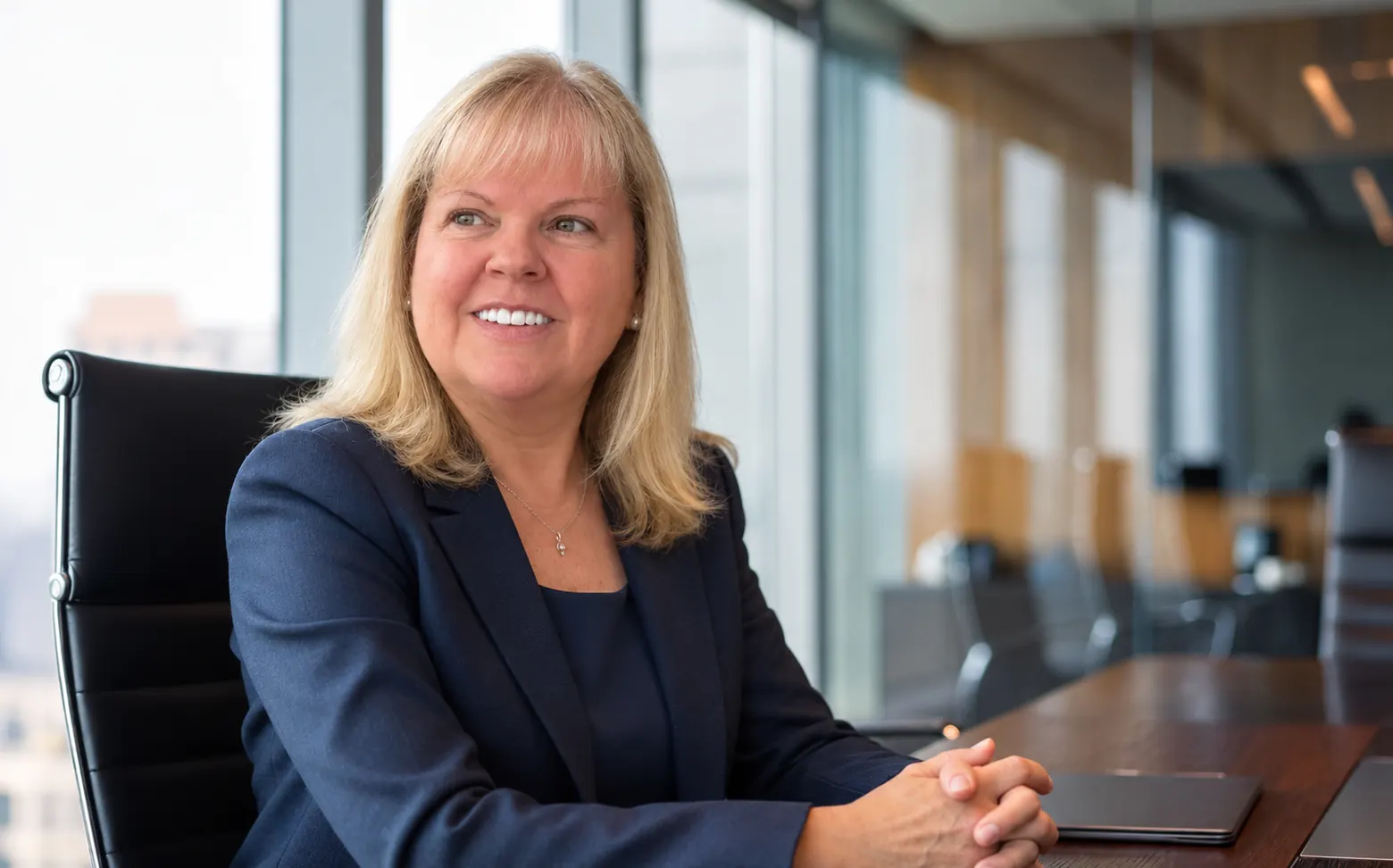 Diana Llorente, founder of Kewl Consulting, at a boardroom table